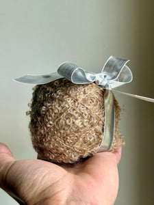 Doll hair of finest bouclé